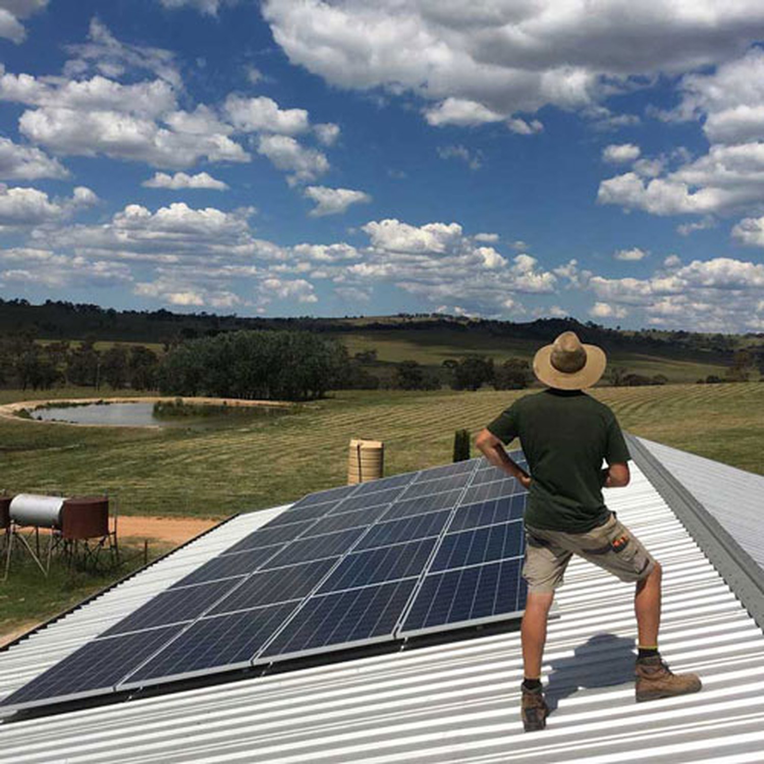 Remote Off Grid Energy technician with an off grid solar installation